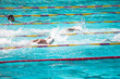 Swimmers Splashing in Competition Swimmers Splashing in Competition