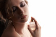 sensual blond woman applying perfume on her body sensual blond woman applying perfume on her body