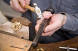 Goldsmith work in process with hammer Goldsmith work in process with hammer