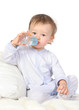 baby is drinking water from bottle