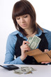 Photo: young business woman counts money young business woman counts money