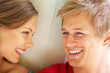 Happy young beautiful woman looking at her boyfriend