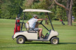Father and Son in Golf Cart Father and Son in Golf Cart