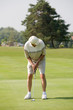 Elderly Man Playing Golf Elderly Man Playing Golf