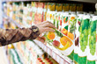 Shelves with juices in a supermarket