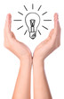 Hand holding drawn light bulb Hand holding drawn light bulb