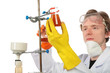 Chemist fixes flask on support