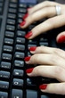 Keyboard and womans hand typing Keyboard and womans hand typing