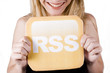 beautiful woman holding rss logo