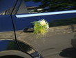 Photo: Wedding car decorated with flowers Wedding car decorated with flowers