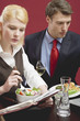 stressed office colleagues working through lunch