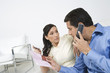 Couple Holding Credit Cards