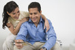 Couple Holding Credit Card