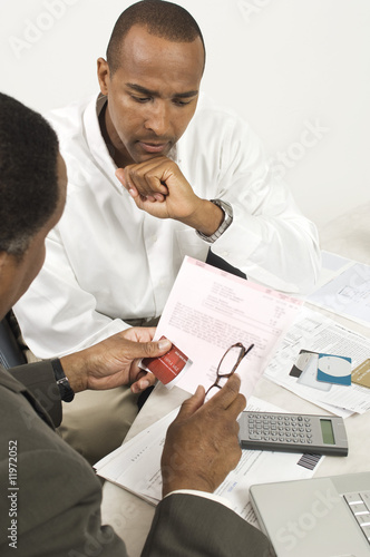 Photo: Accountant and Client Accountant and Client
