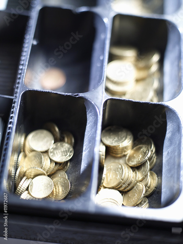 Photo: coins in an open till coins in an open till