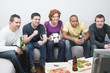 friends with football, beer & pizza sitting in front of tv