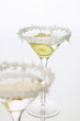 sambuca with lemon in coconut-rimmed glass