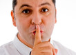 american man indicating for silent