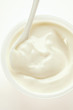 yoghurt in pot with spoon