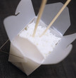cooked rice in a to-go container