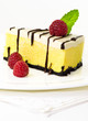 A Slice of vanilla Cheesecake with raspberry A Slice of vanilla Cheesecake with raspberry