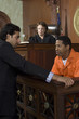 Judge watching prosecution in court
