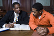Criminal with lawyer in court