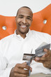 Man Cutting up Credit Cards