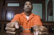 Handcuffed criminal in court
