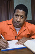 Criminal writing in court, portrait