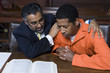 Lawyer embracing criminal in court