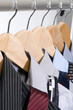Dress Shirts and Ties on Hangers.