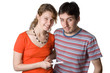 Couple looking at positive home pregnancy test