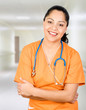 Happy Hispanice Health Care Practitioner in Hospital Setting Happy Hispanice Health Care Practitioner in Hospital Setting