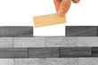business concept. hand building wall