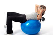 Sportswoman exercising on a Fitness Ball