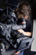 35 mm Camera and The Cameraman