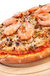 Whole seafood pizza with big shrimps