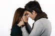 attractive couple passionately looking into each others eyes attractive couple passionately looking into each others eyes