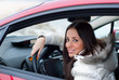 young woman in a car