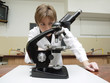 Chemistry teacher with microscope