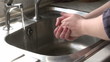 Woman cleaning her hands footage
