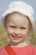 Portrait of cheerful girl on the beach