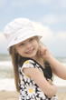 Cheerful girl in beautiful dress and hat III