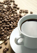 Coffee cup and grain background Coffee cup and grain background