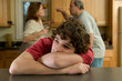 Teenage boy suffers while parents fight