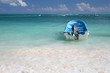 Sail Boat in a Tropical Green Ocean