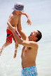 Man and son at the beach