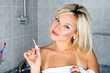 girl in bathroom with lipstick