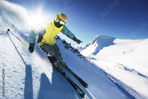 Photo: Skier in high mountains Skier in high mountains